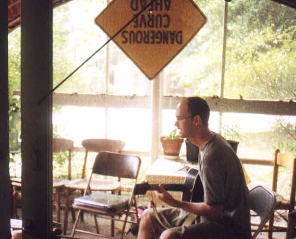 Michael practices on the porch